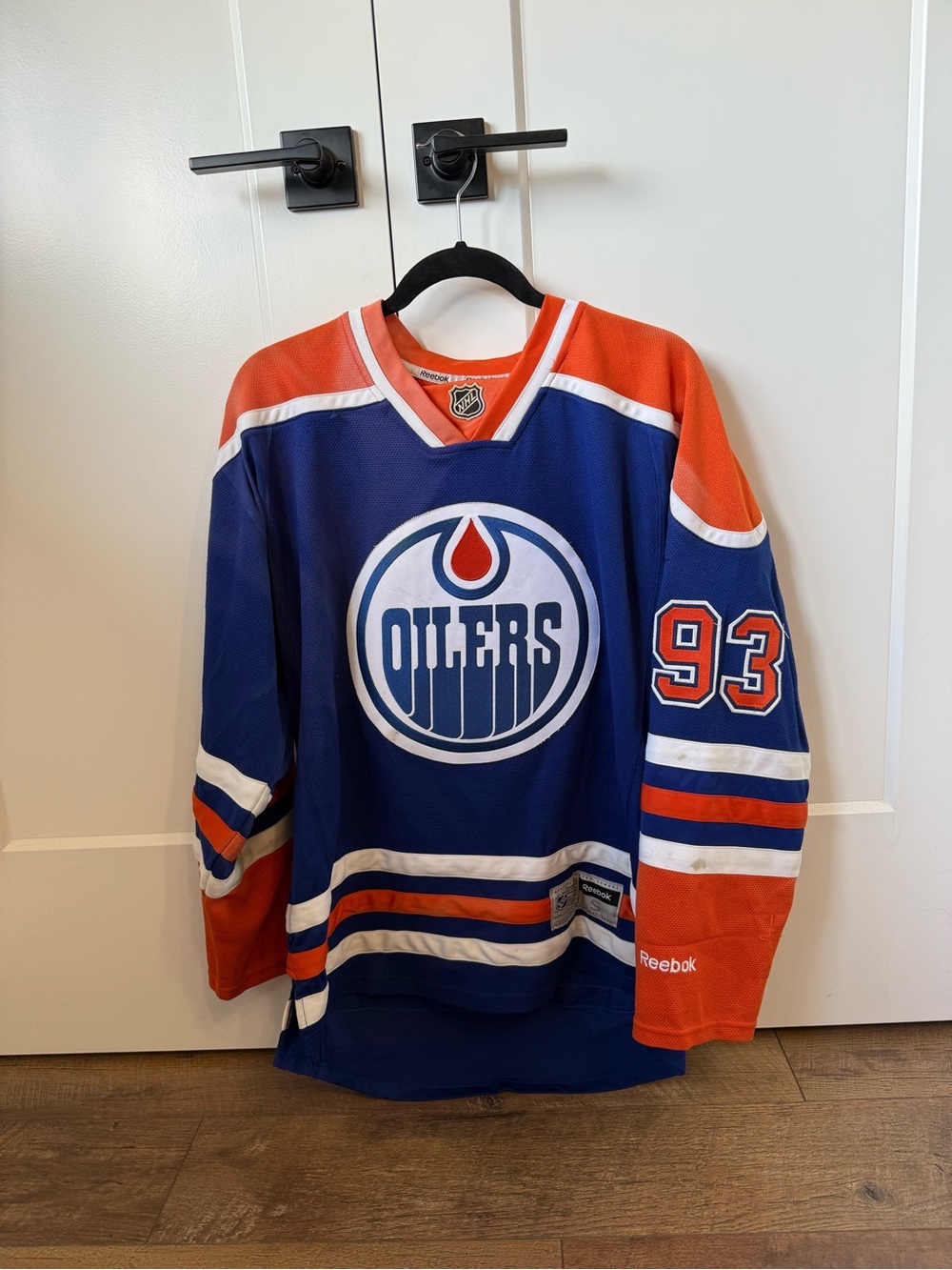 Reebok Blue and Orange Edmonton Oilers Hockey Jersey with 93 Sleeve